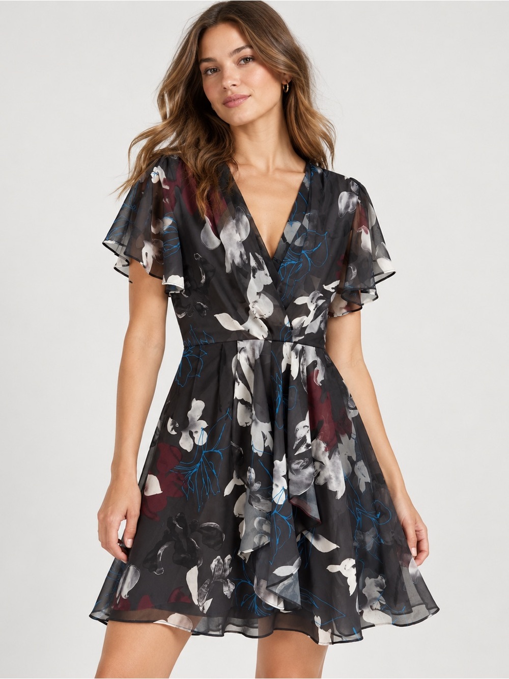 Reiss features an elegant V-neckline and soft, flowing cap sleeves